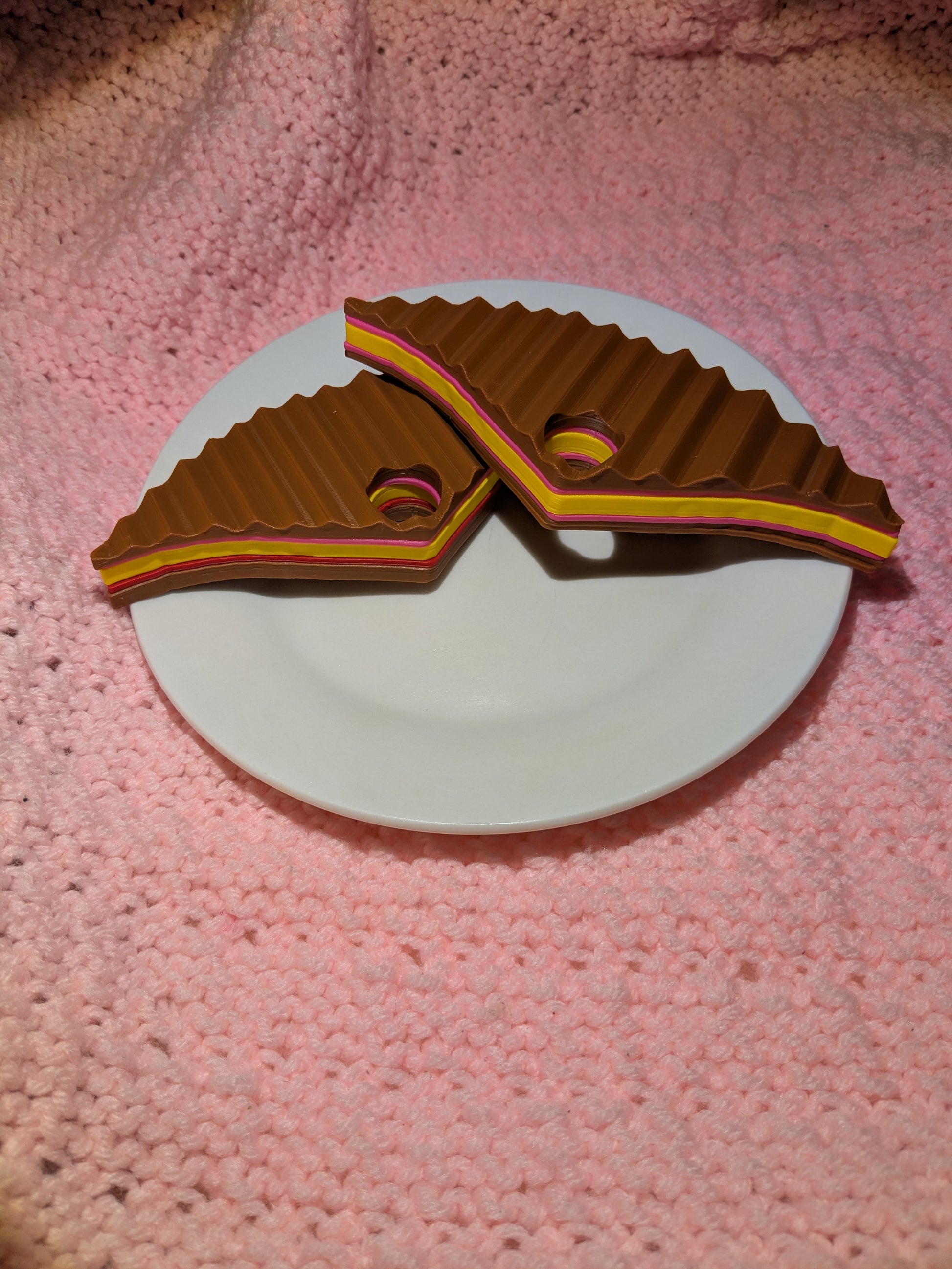 plastic panini sandwich book holders on a plate